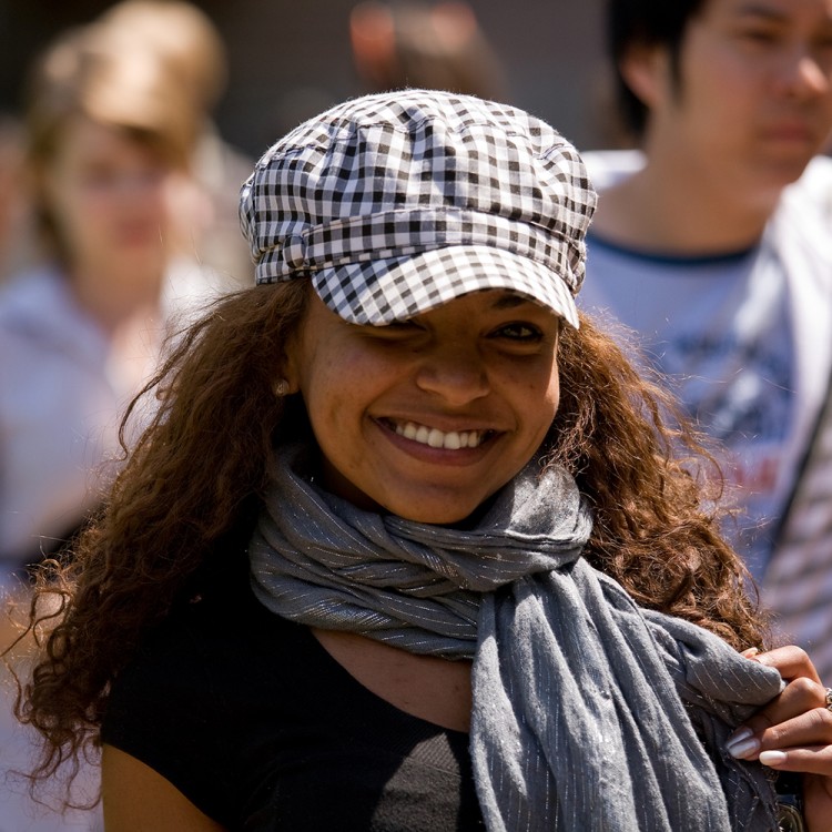 Portrait of student walking during class break. Photo by Doug Plummer