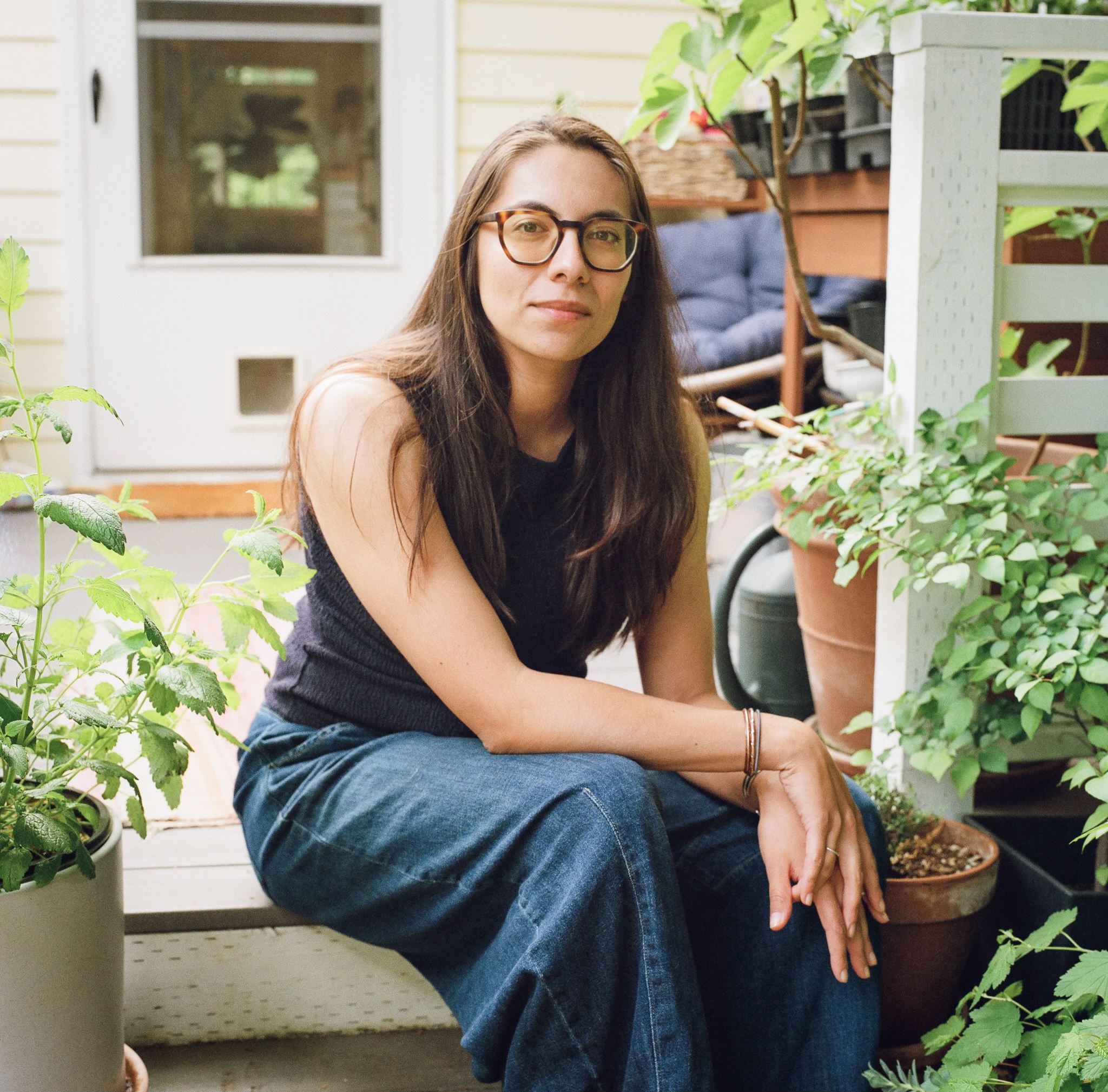 Olivia Orosoco in a garden.