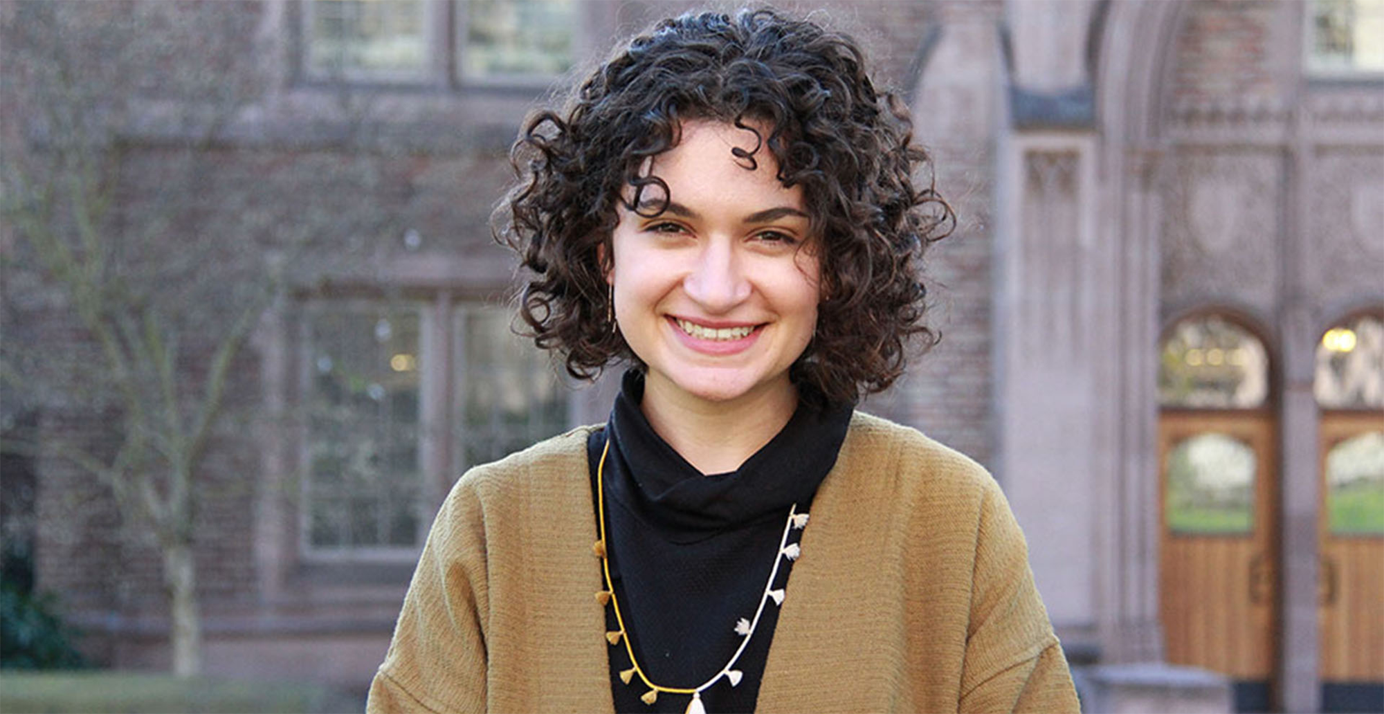 Current student smiling on Red Square